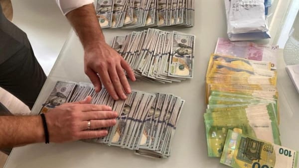 Percheziții într-un dosar de corupere electorală. Oamenii legii au confiscat peste un milion de lei