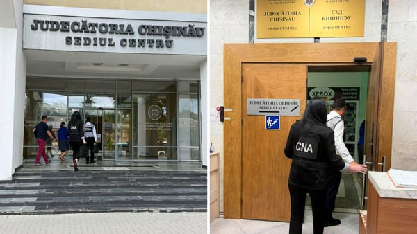 Percheziții într-un dosar cu peste 10.000 de euro la Judecătoria Chișinău, sediul Centru. Un avocat și un angajat, reținuți