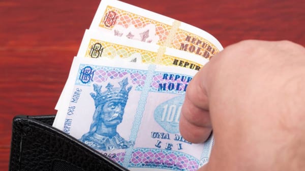 Leul moldovenesc se depreciază față de euro și dolarul american